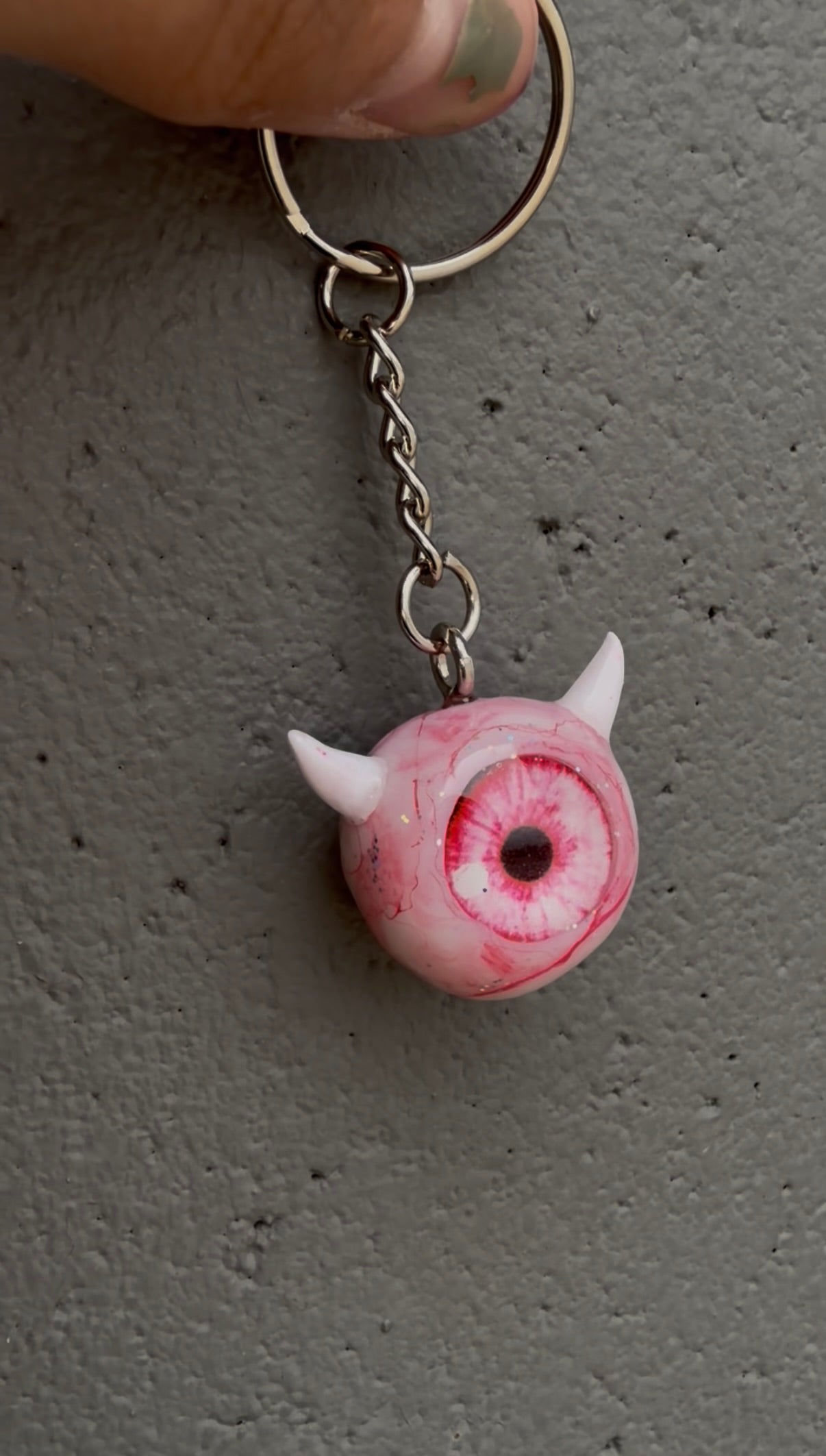 Pink sparkly devil eyeball keychain