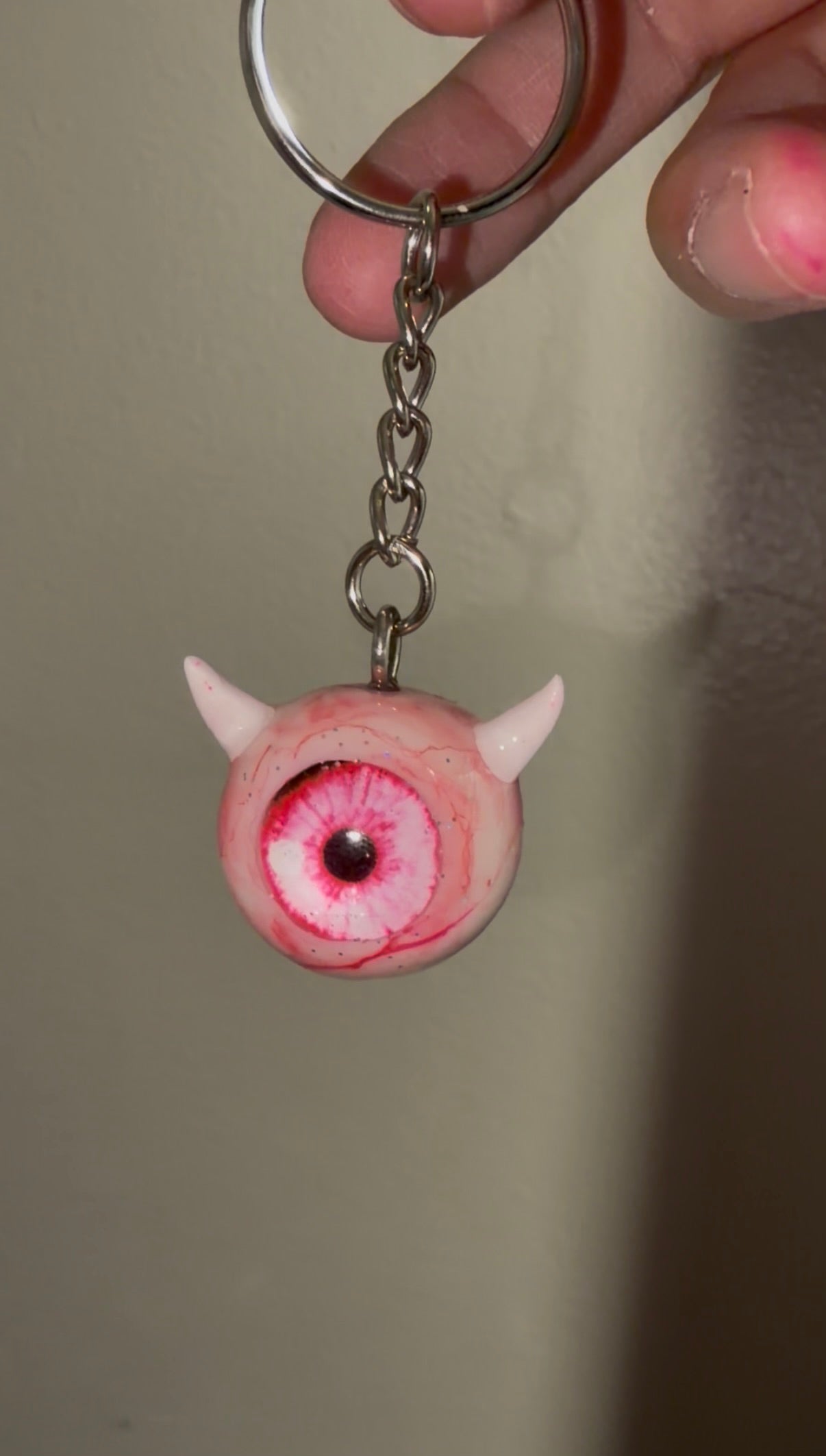 Pink sparkly devil eyeball keychain