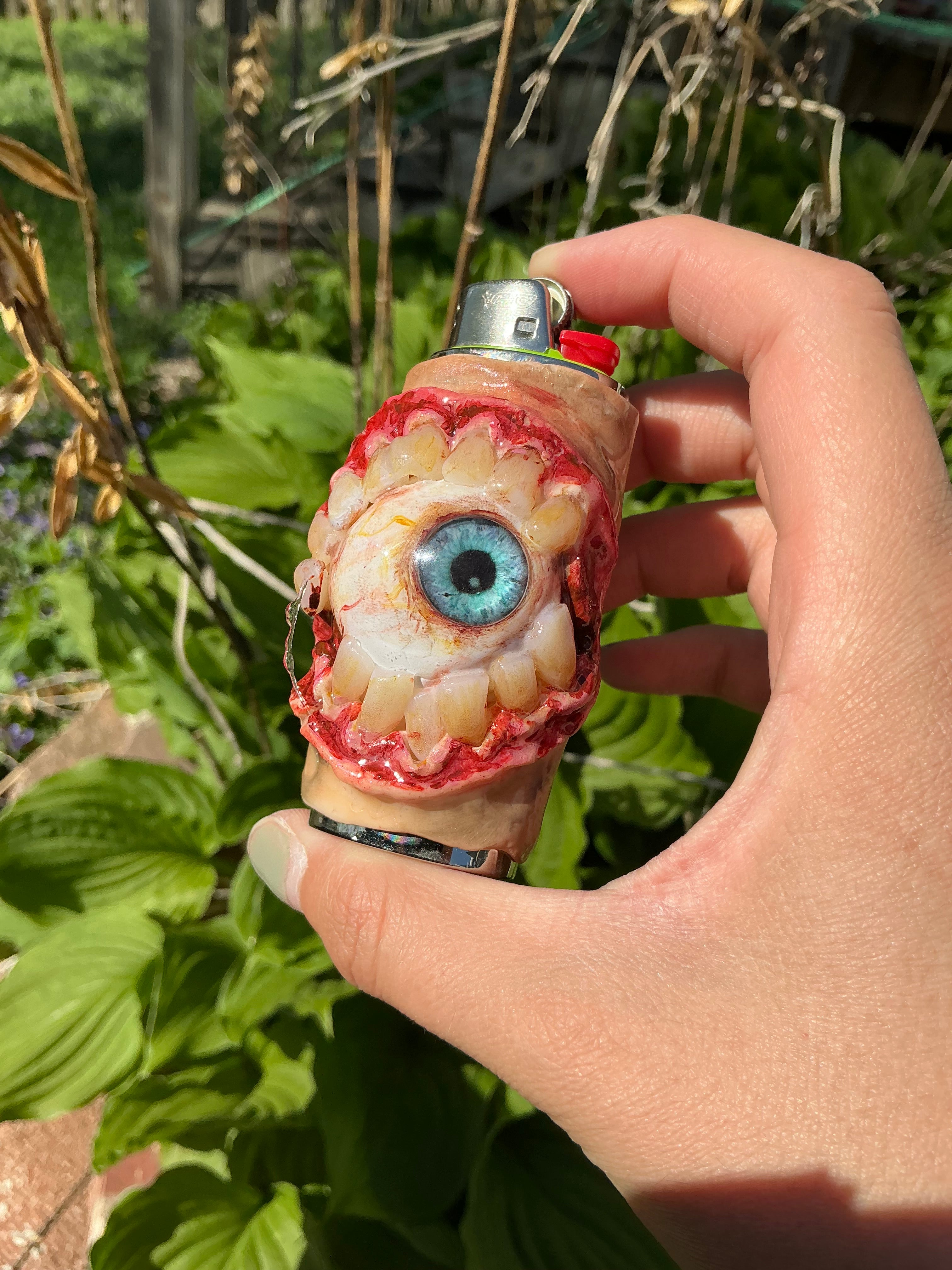 Hungry vision | creepy drooly eye lighter case