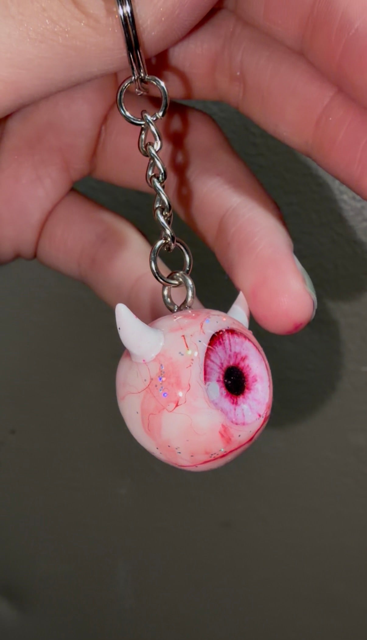 Pink sparkly devil eyeball keychain
