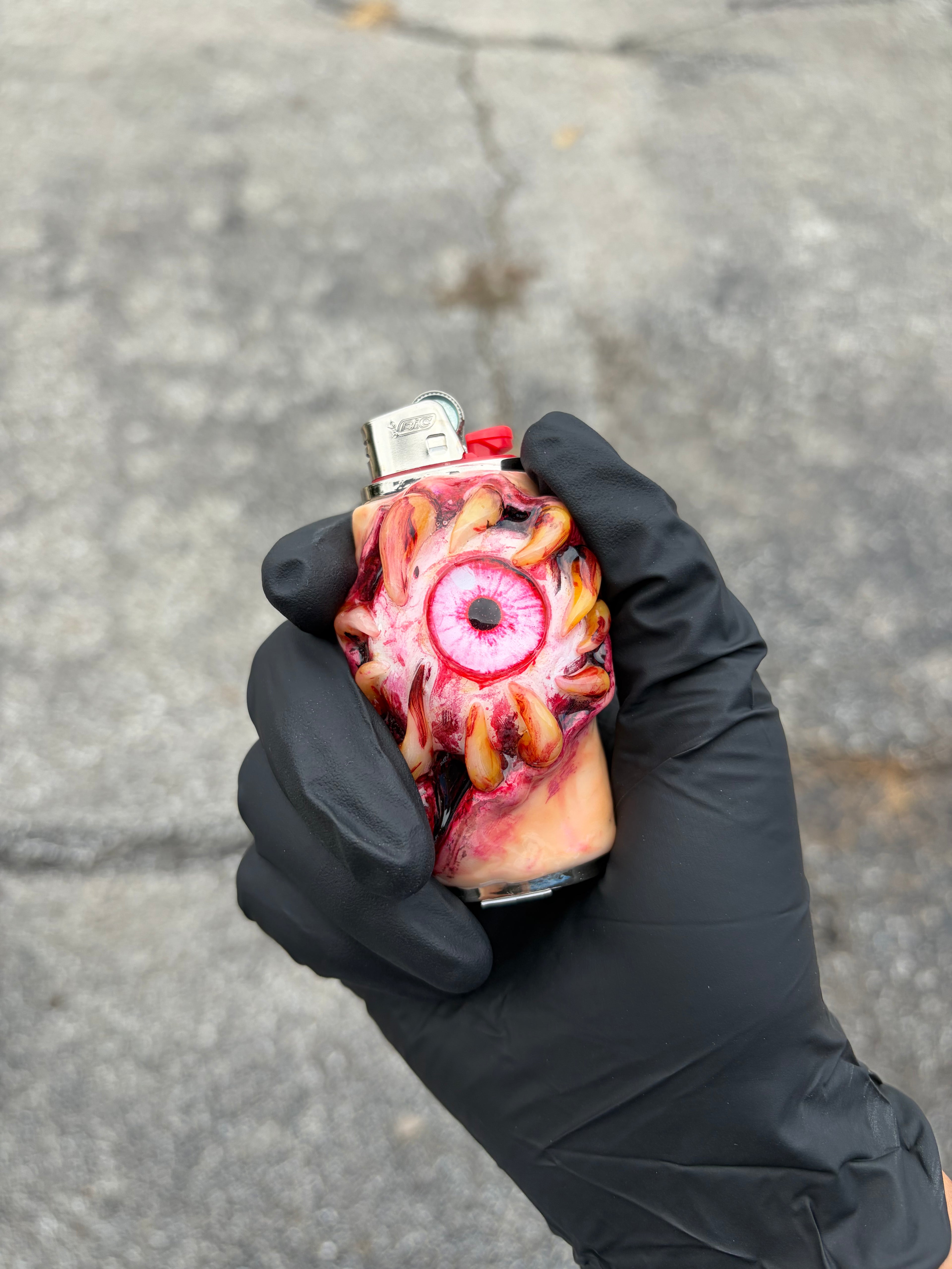 Pink teething eye ball gory lighter case