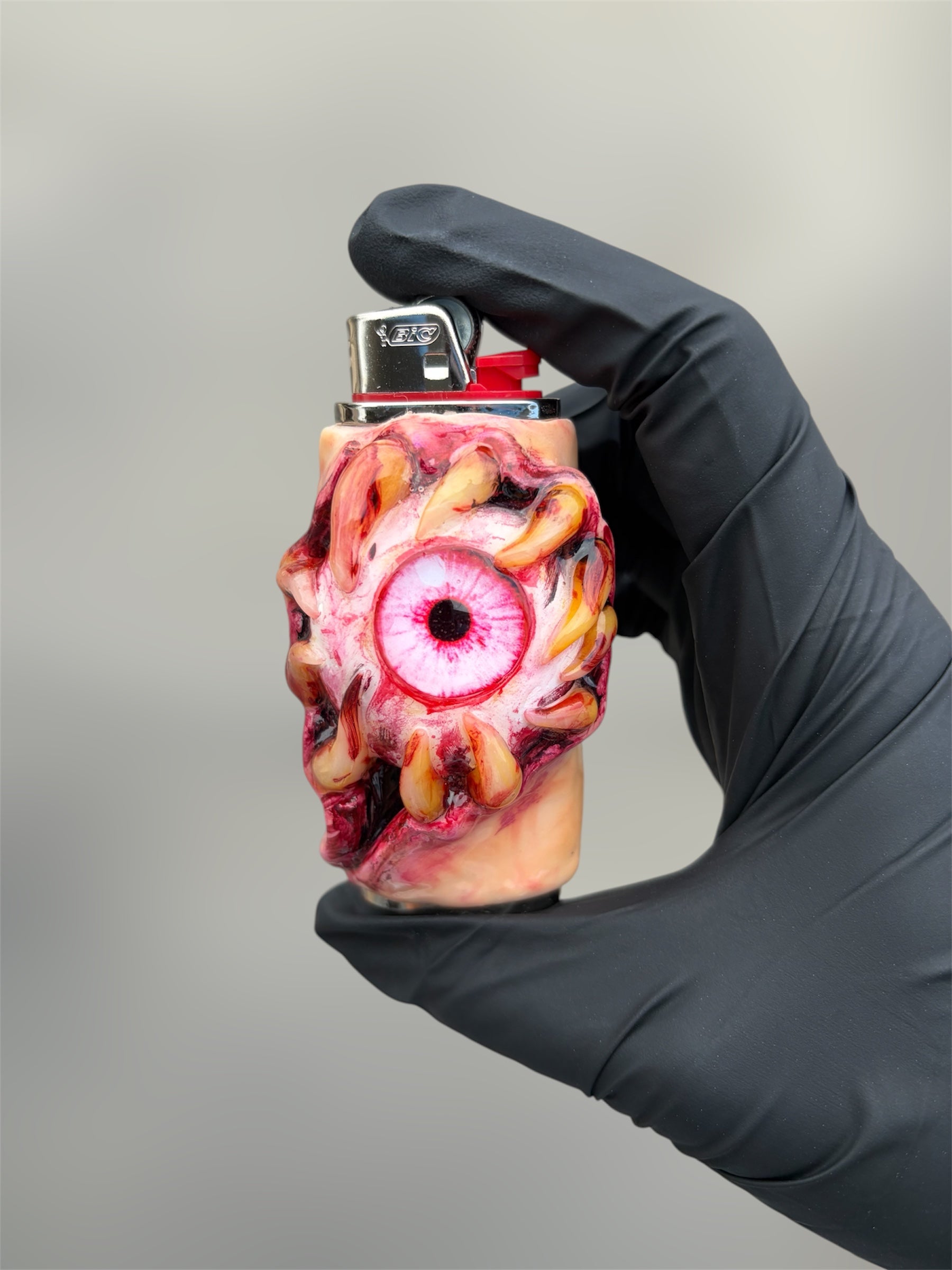 Pink teething eye ball gory lighter case